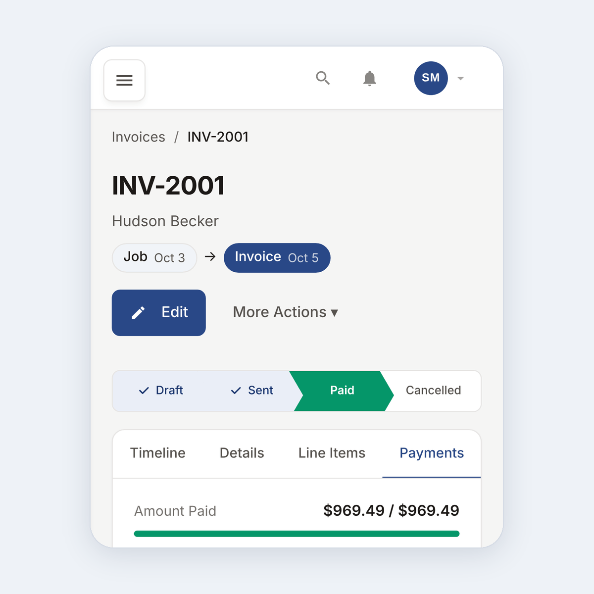 Phone showing a paid invoice with a green checkmark